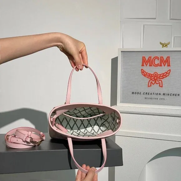 MCM shoulder bag/crossbody bag, pink with all-over monogram print. - Picture 8 of 9